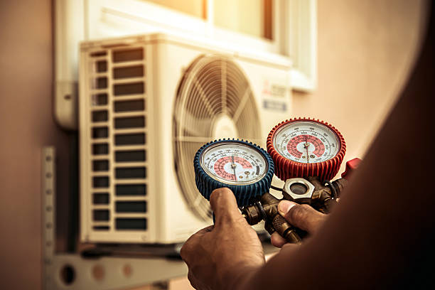 Professional Heat Pump Repair technician working in Elkhart, TX